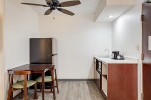 Fridge, microwave, coffee/tea maker, dining tables