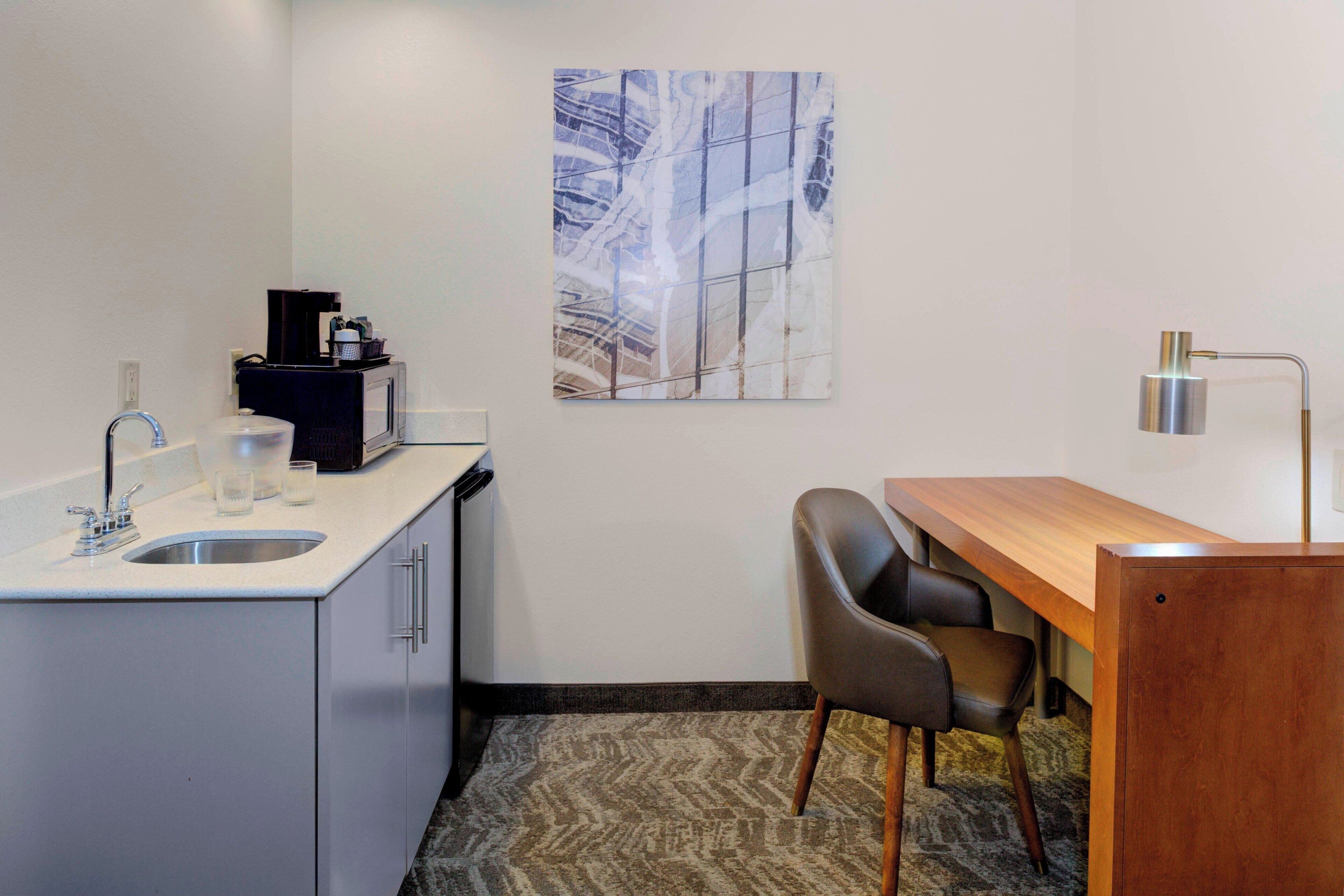 pillow-top beds, desk, laptop workspace, blackout curtains