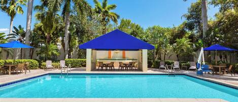 Outdoor pool, open 7:00 AM to 11:00 PM, pool umbrellas, pool loungers