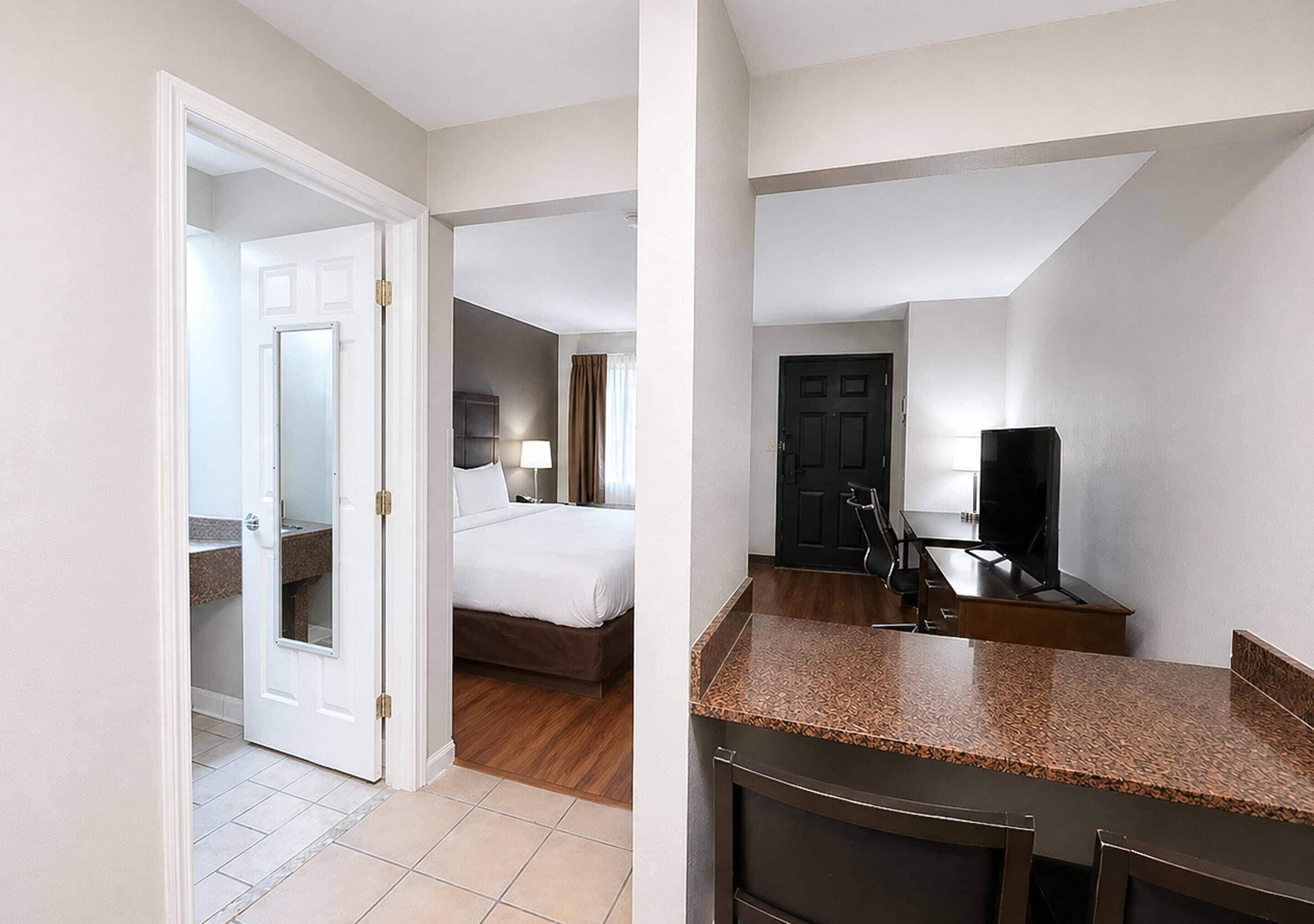 Room, 1 King Bed, Smoking (Efficiency) | In-room safe, desk, iron/ironing board, free cribs/infant beds