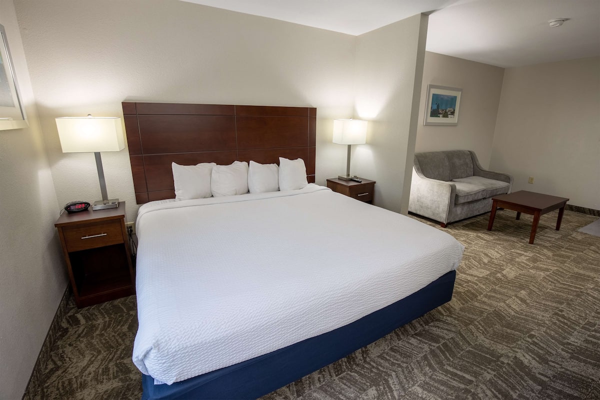 Premium bedding, pillow-top beds, minibar, laptop workspace