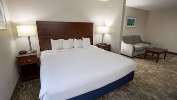 Premium bedding, pillow-top beds, minibar, laptop workspace