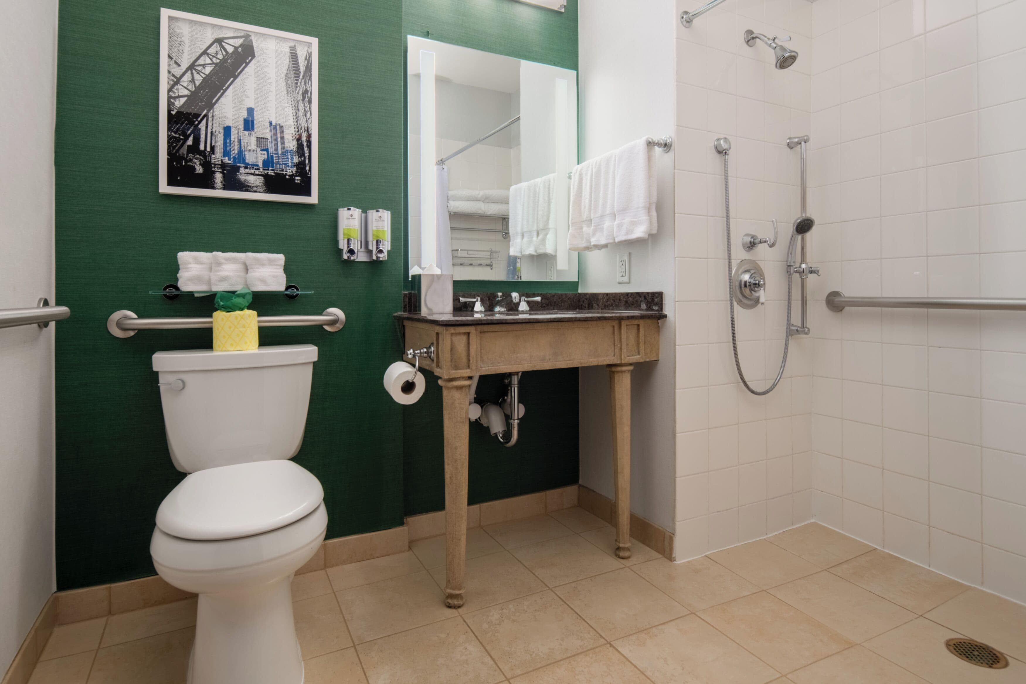 combined shower/bathtub, designer toiletries, hair dryer, bathrobes