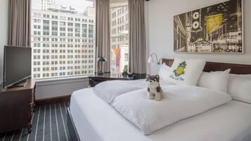 Premium bedding, down duvets, pillow-top beds, in-room safe