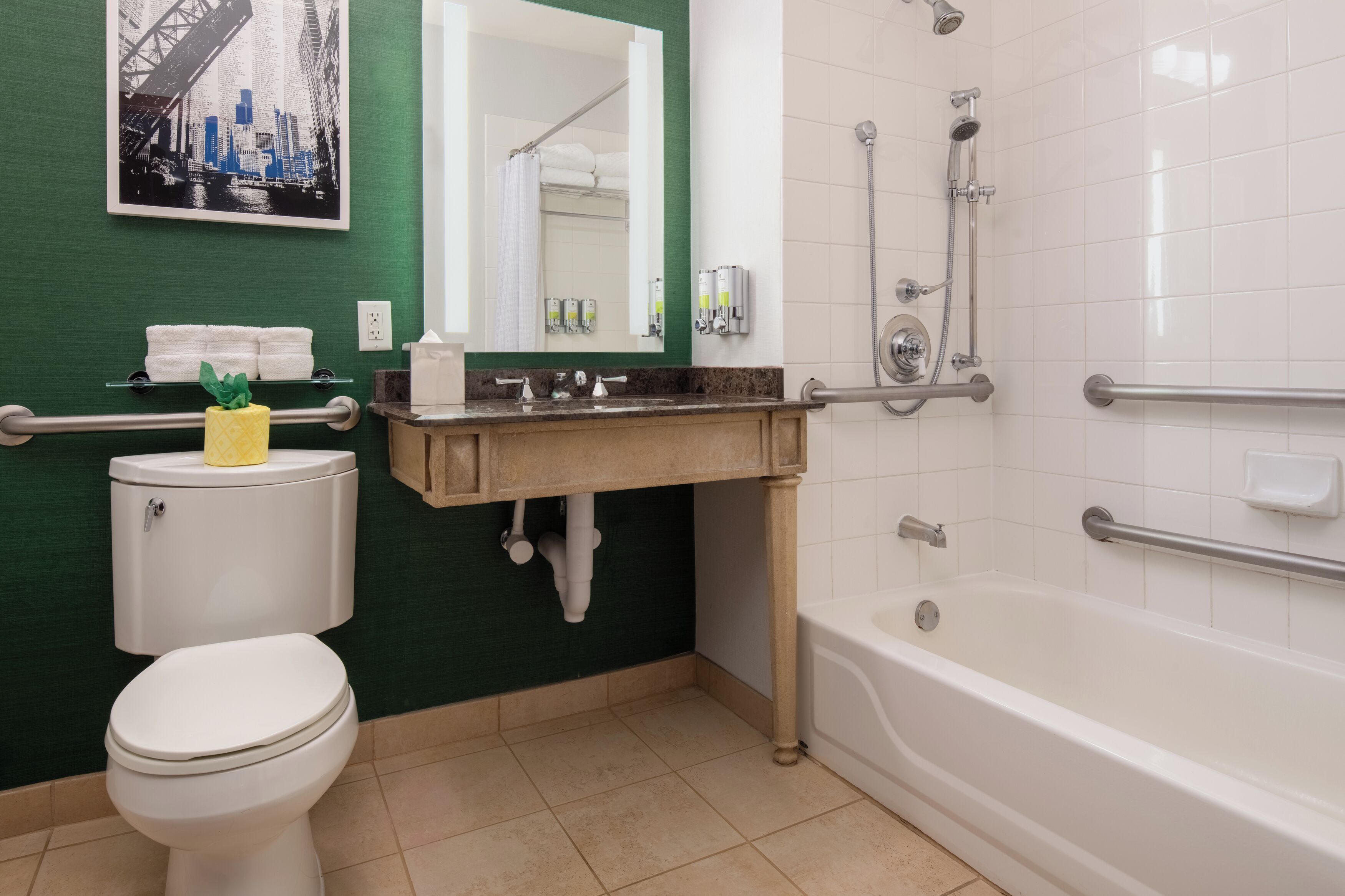 combined shower/bathtub, designer toiletries, hair dryer, bathrobes