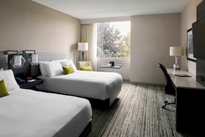 Premium bedding, down duvets, pillow-top beds, in-room safe