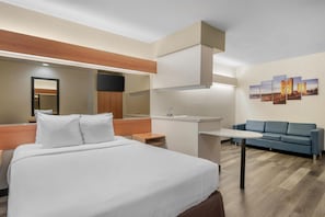 Deluxe Room, 1 Queen Bed, Non Smoking, Refrigerator & Microwave | 1 bedroom, desk, laptop workspace, iron/ironing board
