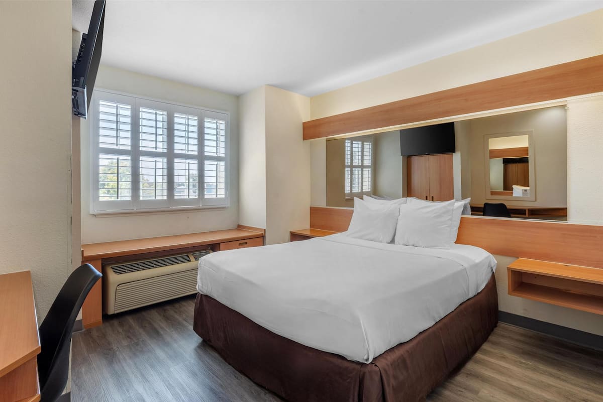 1 bedroom, desk, laptop workspace, iron/ironing board