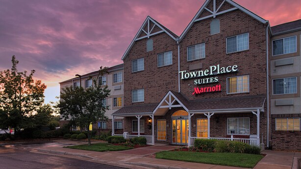 A TownePlace Suites Marriott hotel with a brick facade, multiple windows, and a welcoming entrance. - TownePlace Suites by Marriott Wichita East (Wichita)