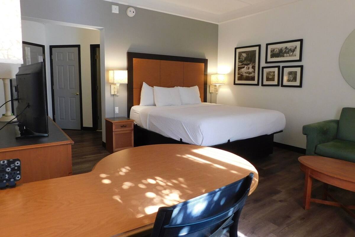 Pillowtop beds, desk, blackout drapes, iron/ironing board