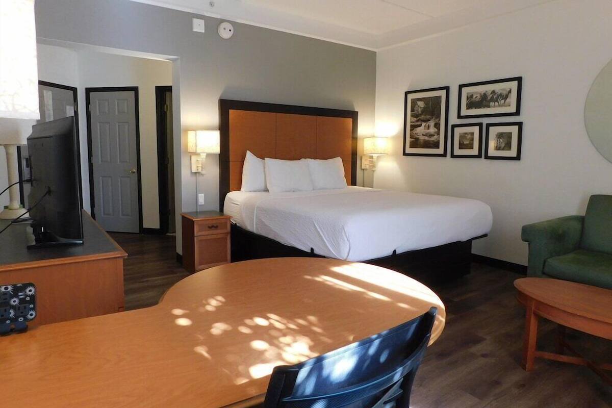 Pillowtop beds, desk, blackout drapes, iron/ironing board