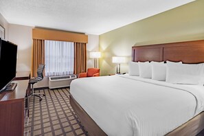 Premium bedding, pillow-top beds, desk, laptop workspace
