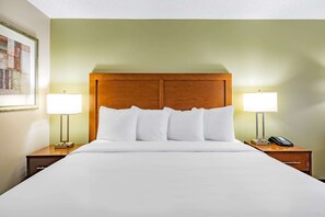 Premium bedding, pillow-top beds, desk, laptop workspace