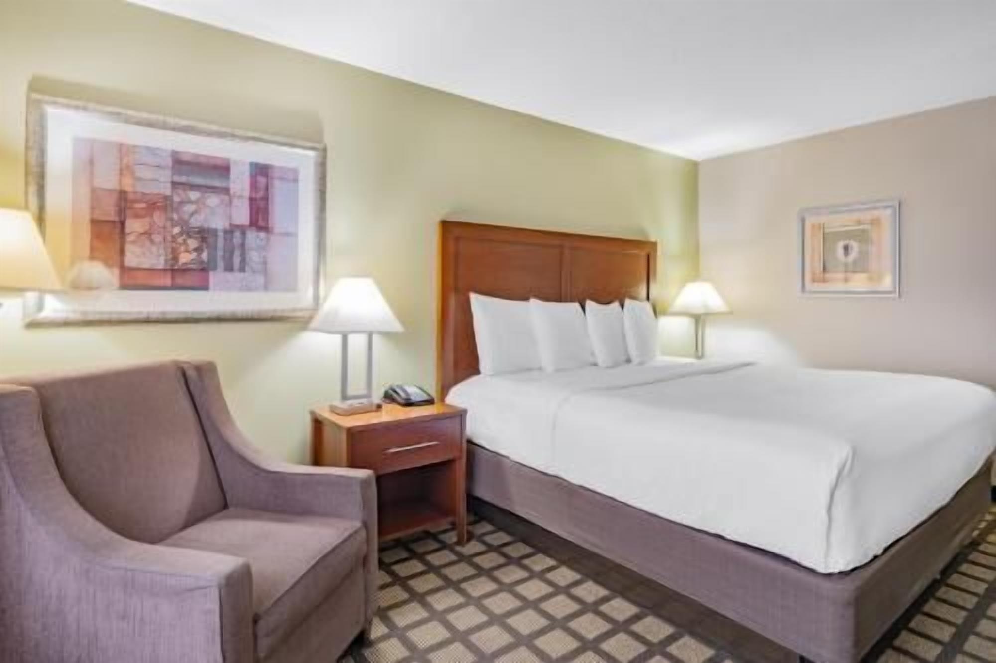 Premium bedding, pillowtop beds, desk, laptop workspace