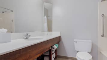 Suite, 1 King Bed, Non Smoking | Bathroom | Combined shower/tub, free toiletries, hair dryer, towels