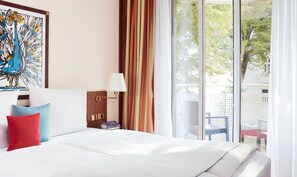 Premium bedding, free minibar, in-room safe, desk