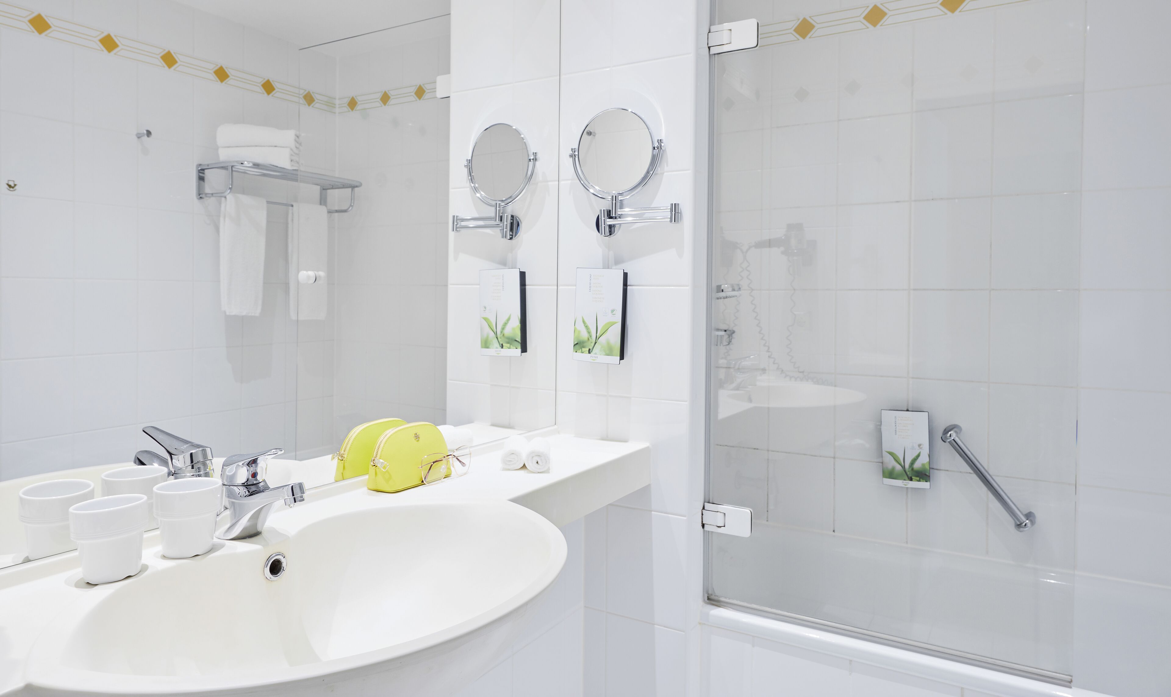 eco-friendly toiletries, hair dryer, towels