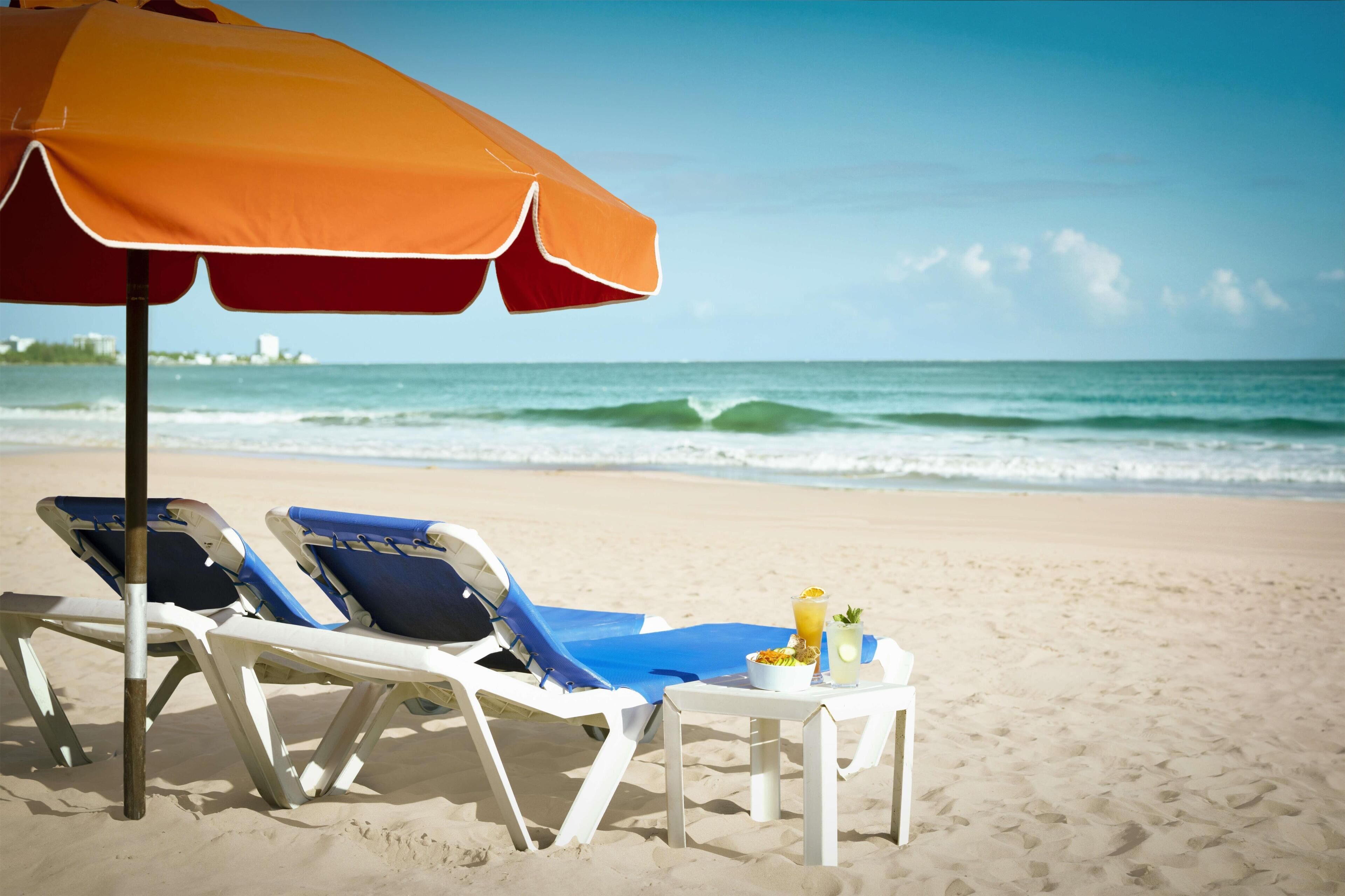 Beach nearby, white sand, sun loungers, beach umbrellas