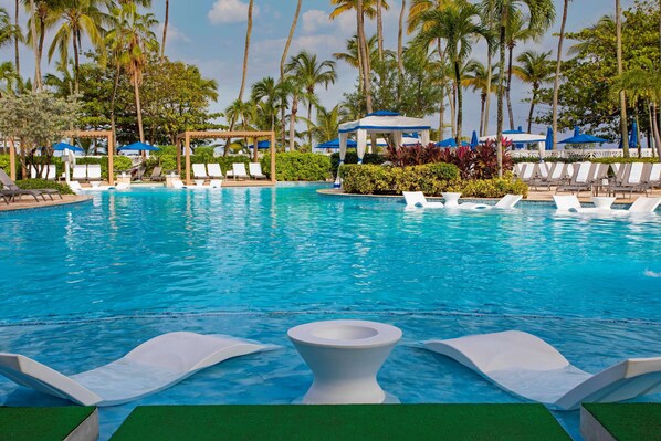 Outdoor pool, open 7:00 AM to 9:00 AM, cabanas (surcharge)