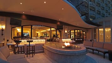 2 bars/lounges, 2 beach bars, swim-up bar, poolside bar