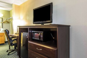 Desk, laptop workspace, blackout drapes, iron/ironing board