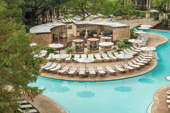 Indoor pool, outdoor pool, cabanas (surcharge), pool umbrellas at The Ritz-Carlton Dallas, Las Colinas