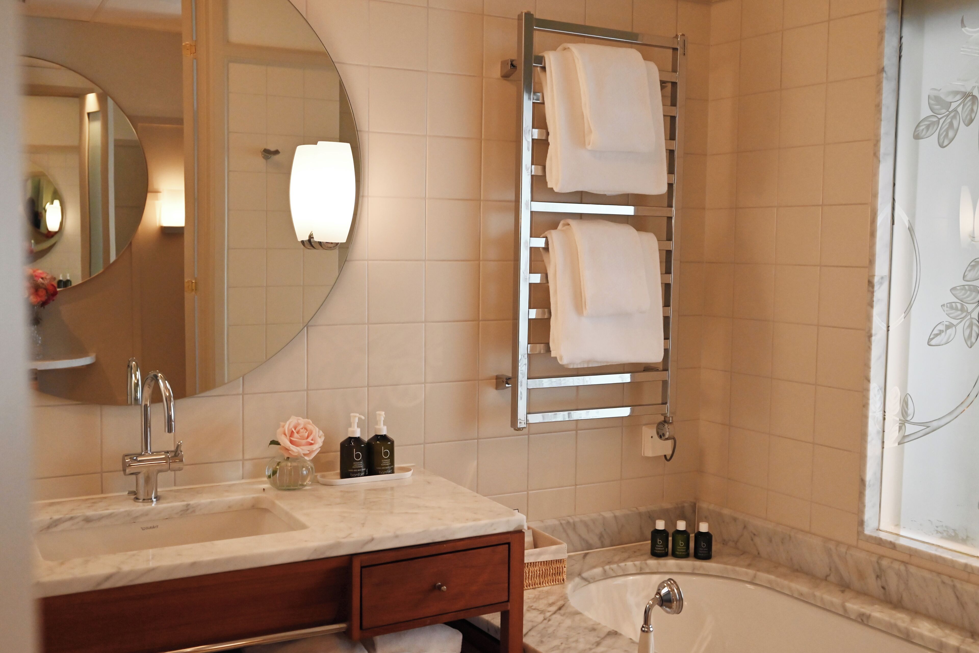 designer toiletries, hair dryer, bathrobes, slippers