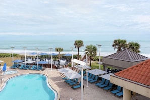 Outdoor pool, a heated pool, open 8 AM to 10 PM, cabanas (surcharge)