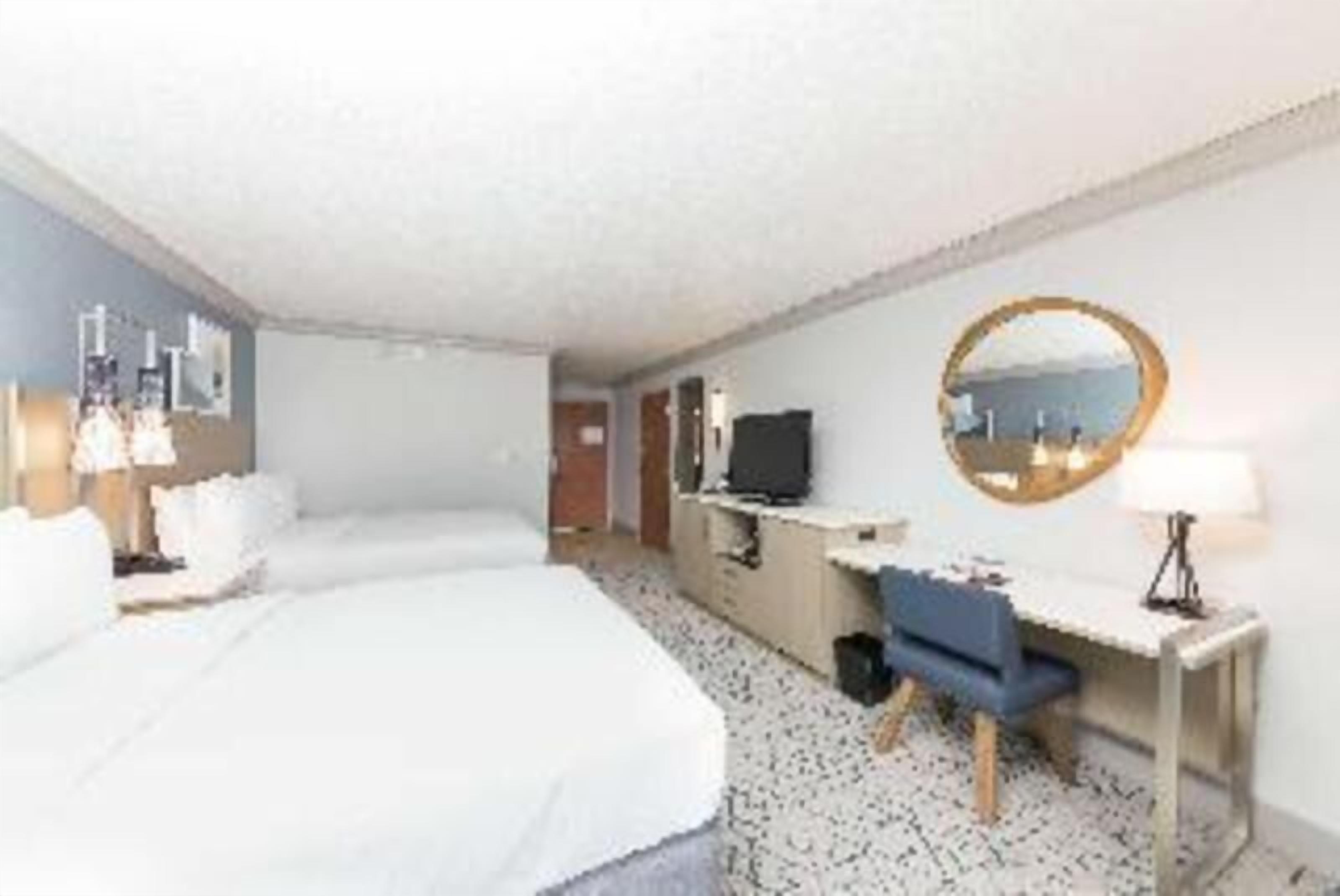 Premium bedding, down comforters, in-room safe, desk