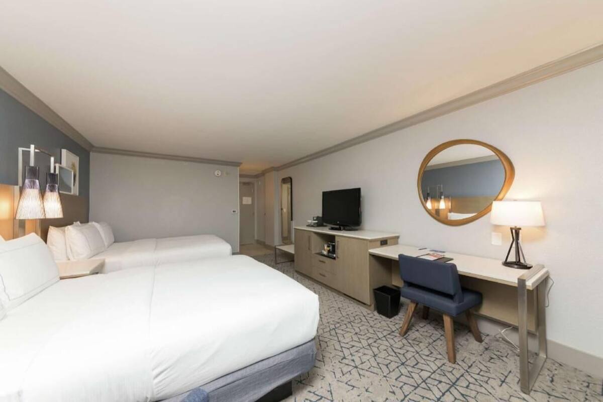 Premium bedding, down duvets, in-room safe, desk