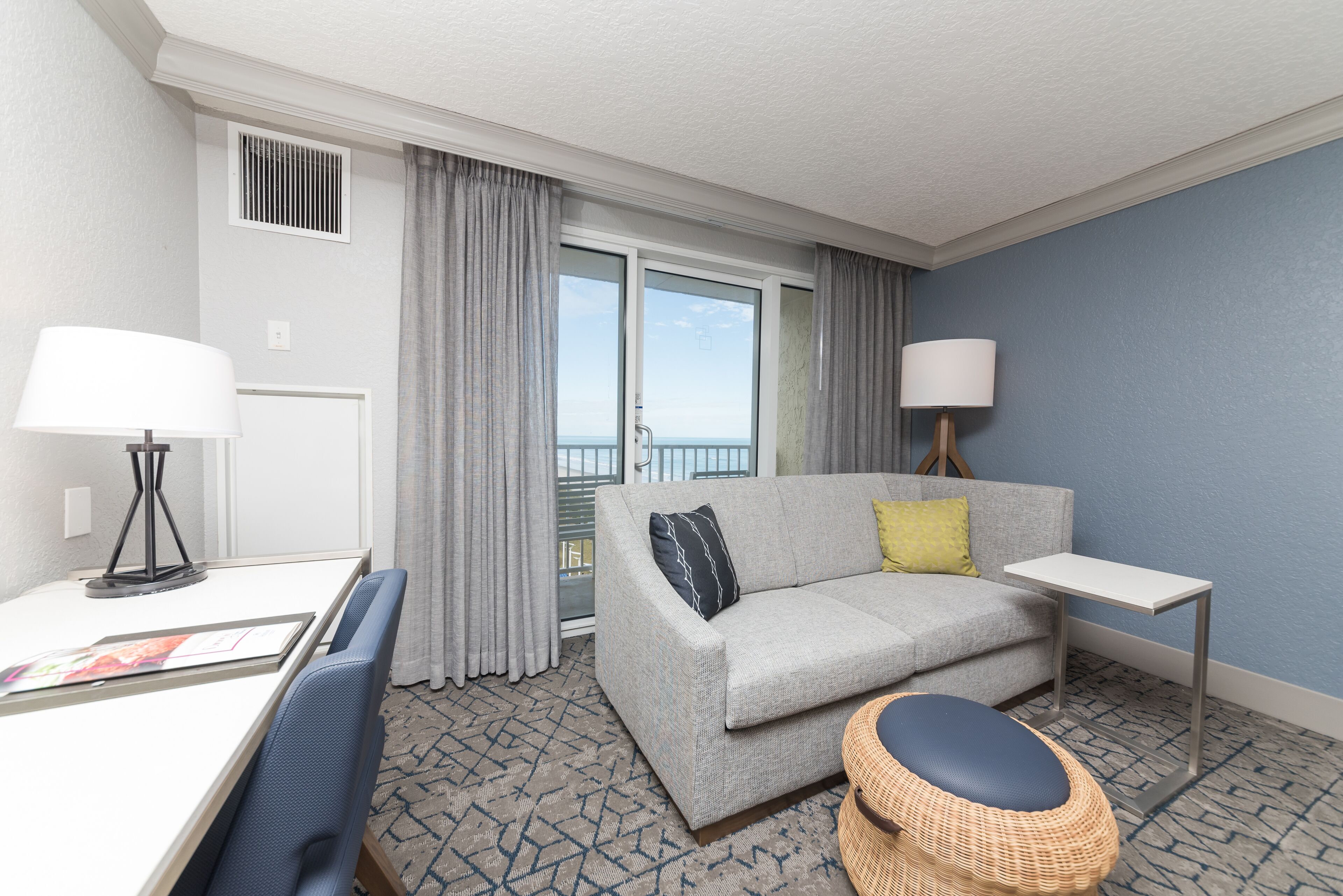 King Bed coastal view w/ full sized balcony | Premium bedding, down duvets, in-room safe, desk
