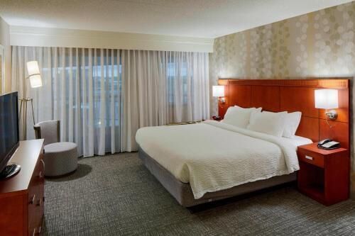 Hypo-allergenic bedding, pillowtop beds, desk, laptop workspace