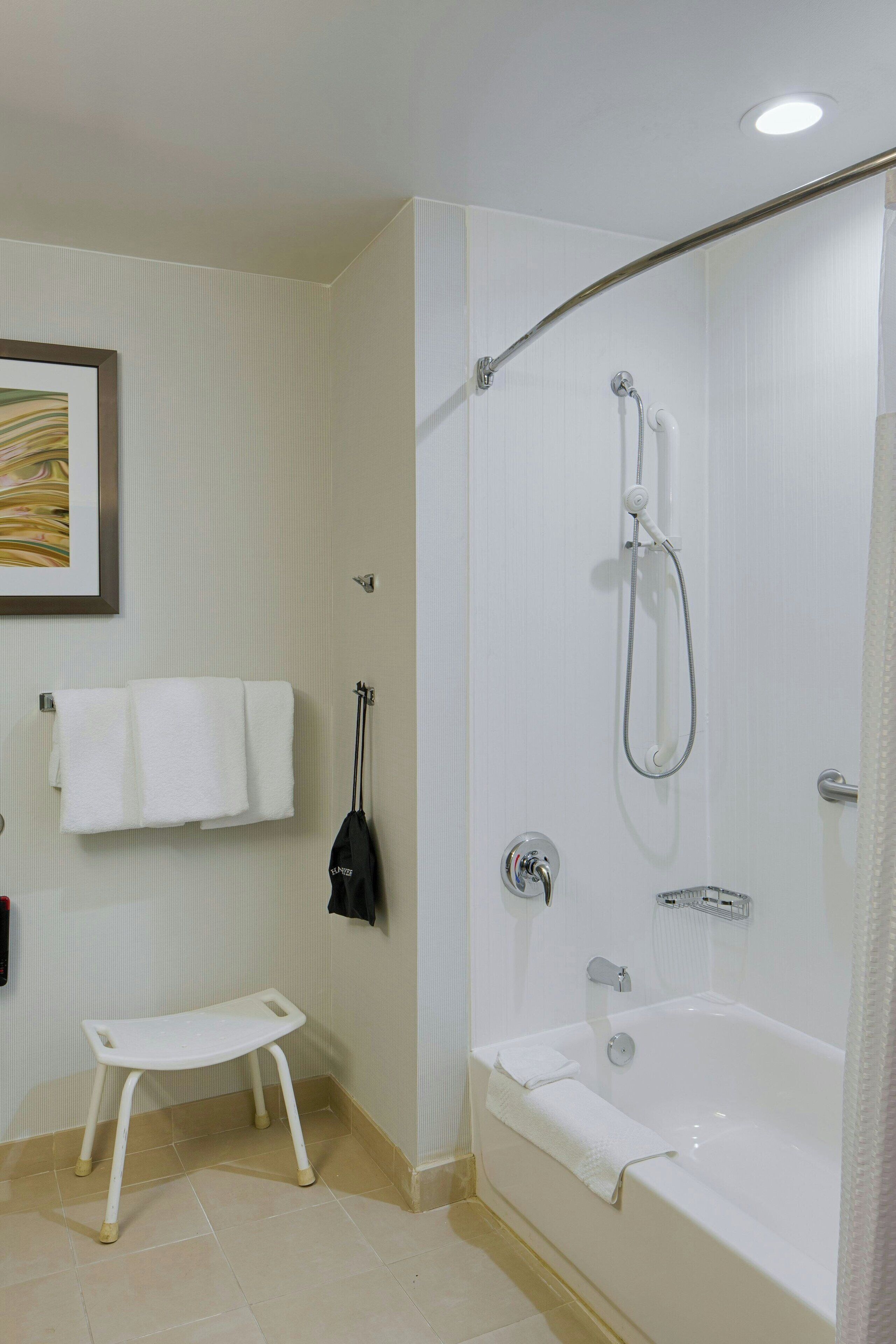 combined shower/bathtub, free toiletries, hair dryer, towels