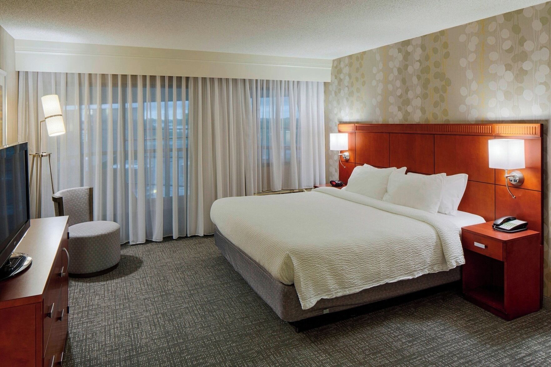 Hypo-allergenic bedding, pillow-top beds, desk, laptop workspace