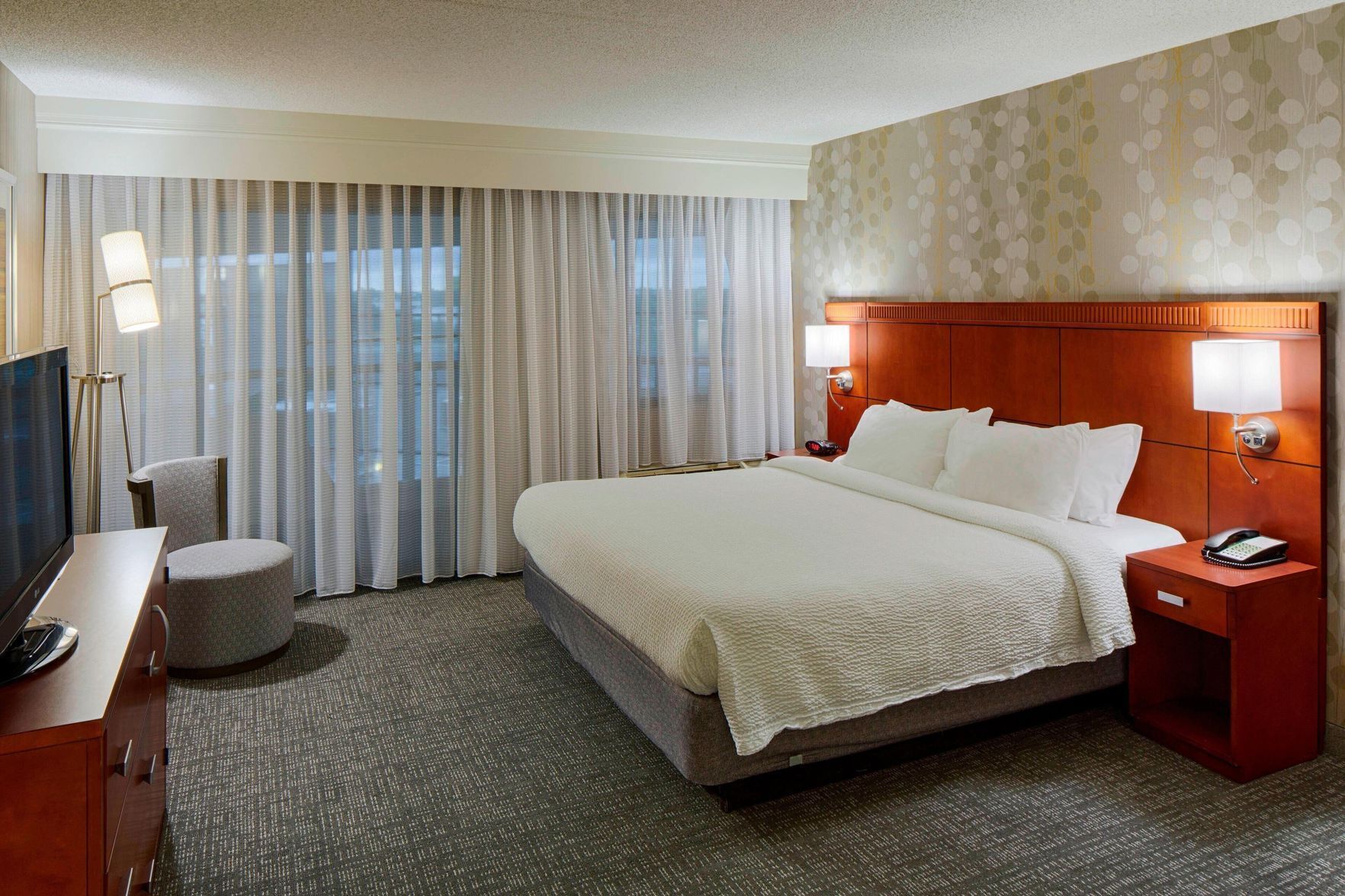 Hypo-allergenic bedding, pillowtop beds, desk, laptop workspace