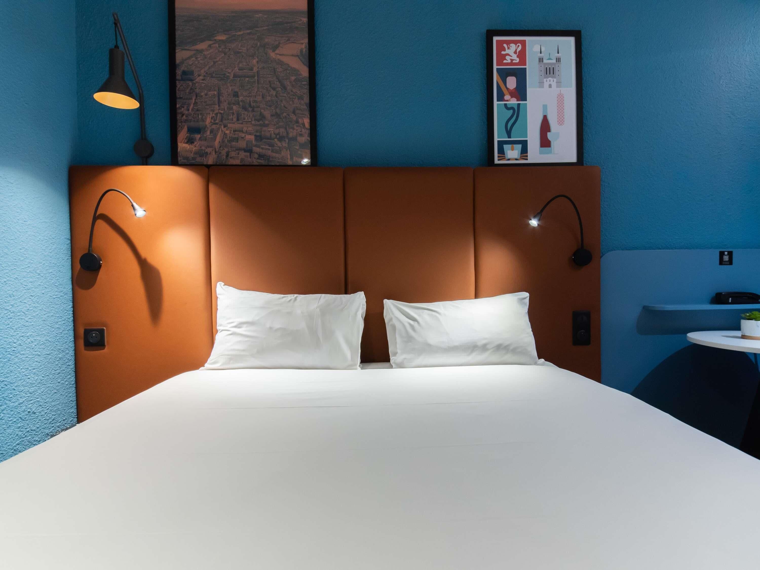 Premium bedding, desk, laptop workspace, soundproofing