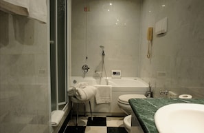 Suite, 1 King Bed | Bathroom | Free toiletries, hair dryer, towels