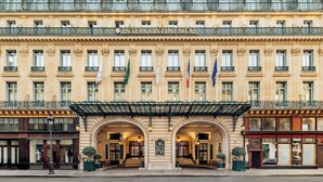 A historic building with a grand entrance, multiple flags, and classic architecture. - InterContinental Paris le Grand by IHG (Paris)