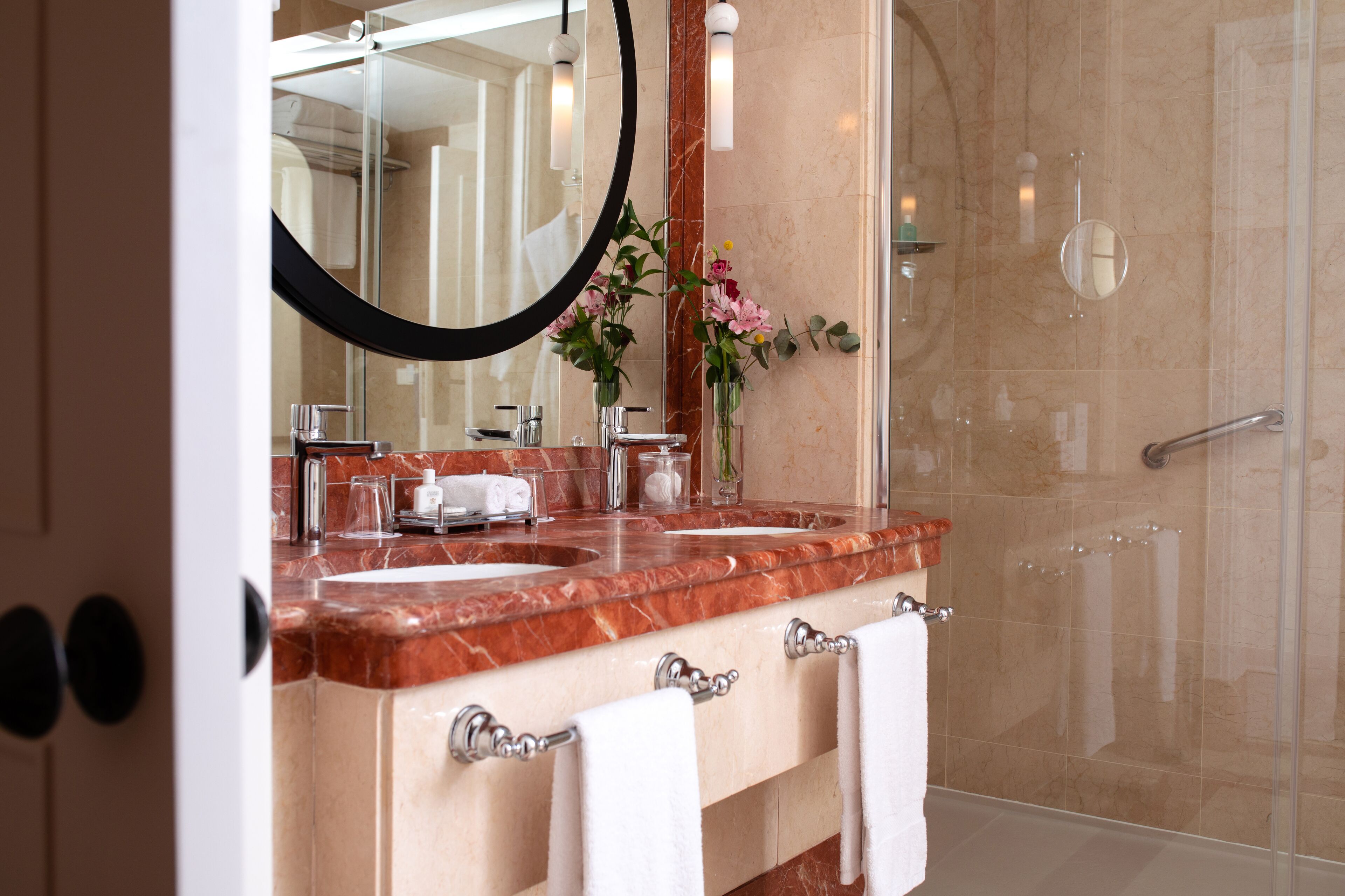 hair dryer, bathrobes, slippers, towels