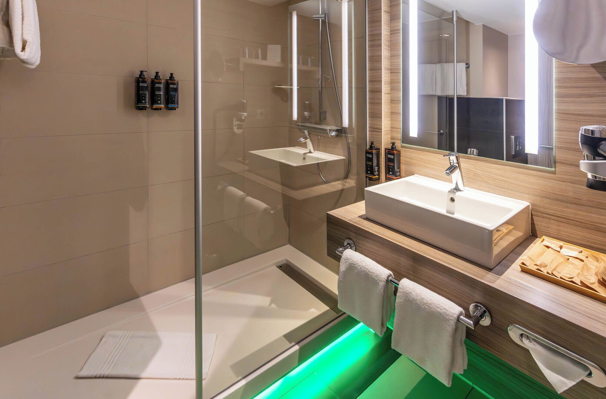 Eco-friendly toiletries, hair dryer, towels, soap