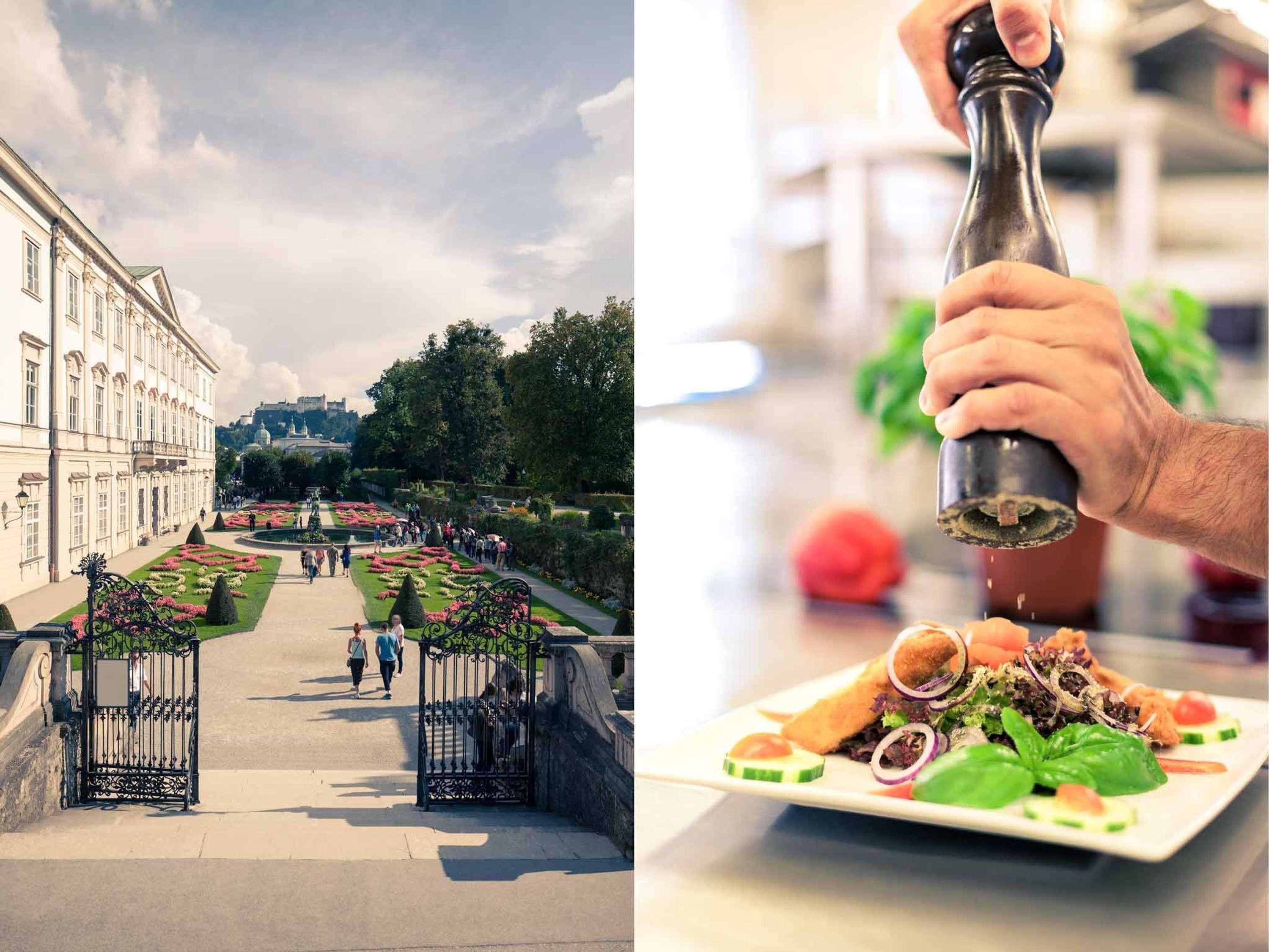 A historic building with a garden pathway and a dining scene with a plate of food.