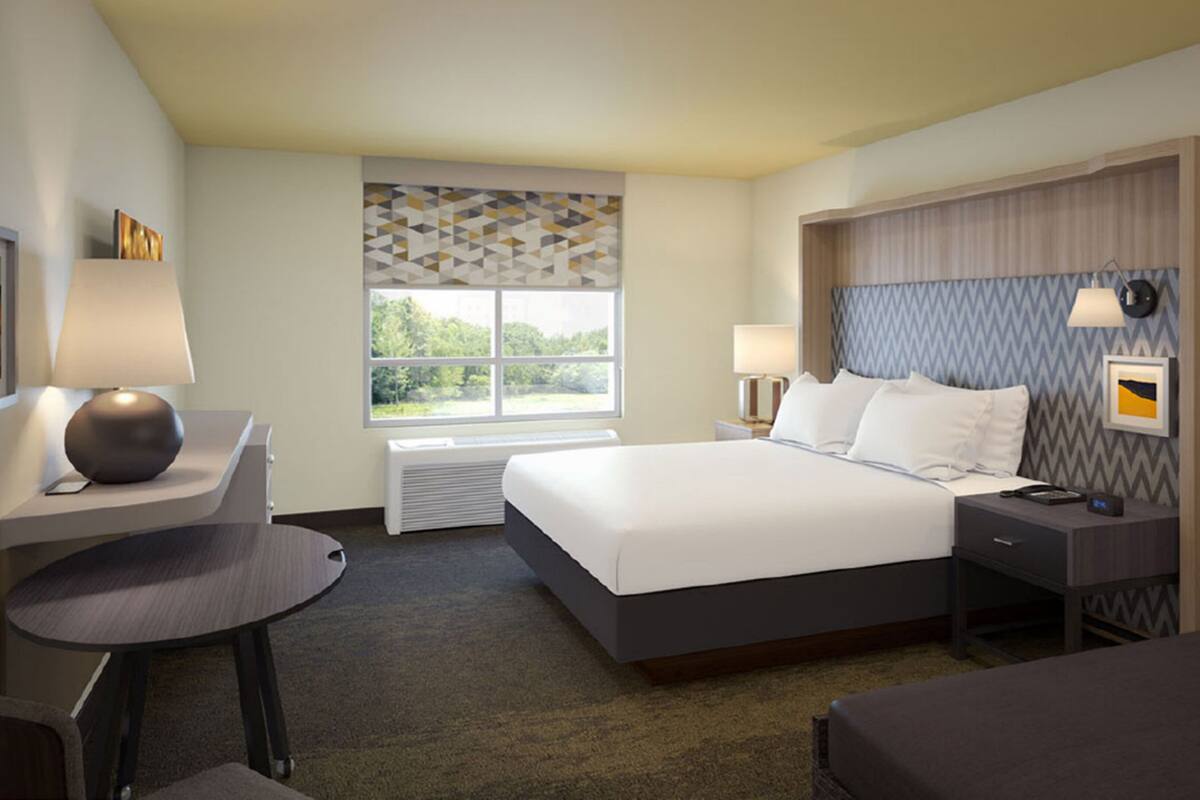 Down duvets, pillow-top beds, desk, blackout curtains