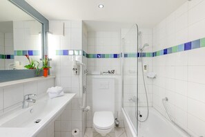 Eco-friendly toiletries, hair dryer, towels