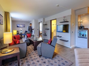 Privilege, Suite, 1 King Bed with Sofa bed | In-room safe, desk, blackout curtains, soundproofing