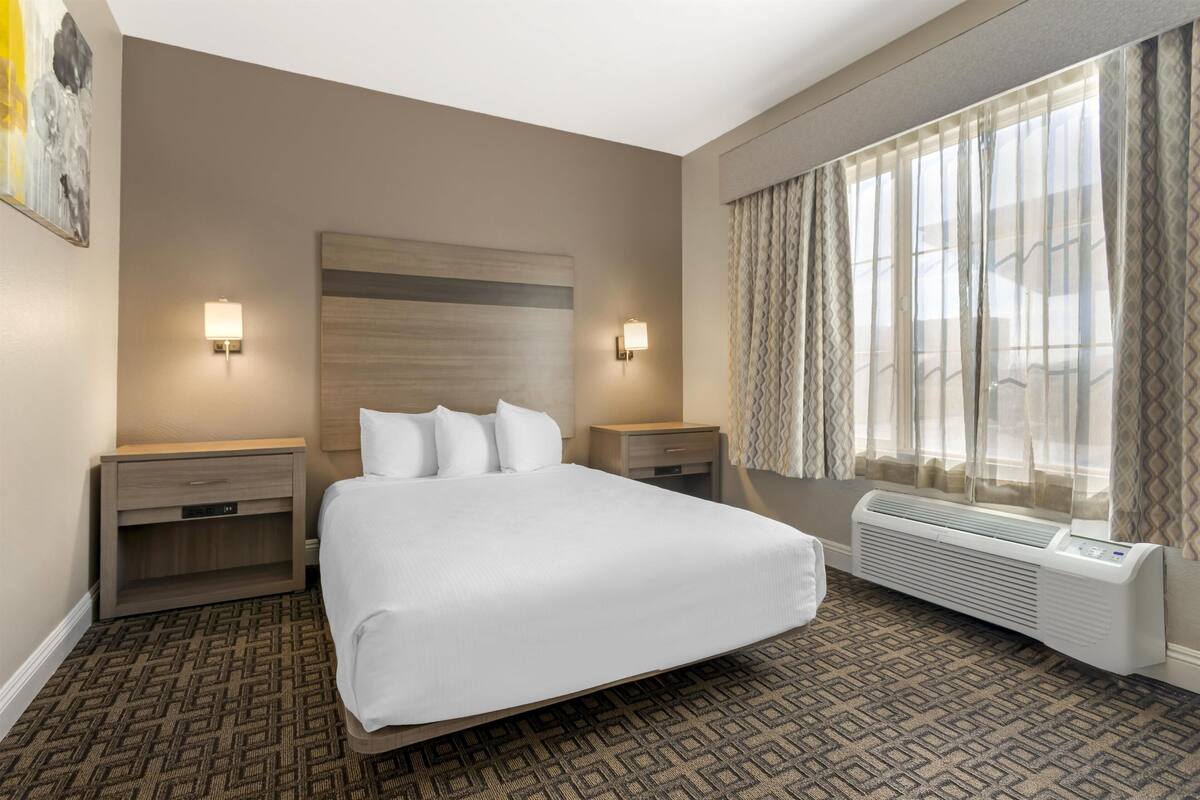 Suite, 1 Queen Bed, Accessible, Non Smoking | In-room safe, desk, laptop workspace, iron/ironing board