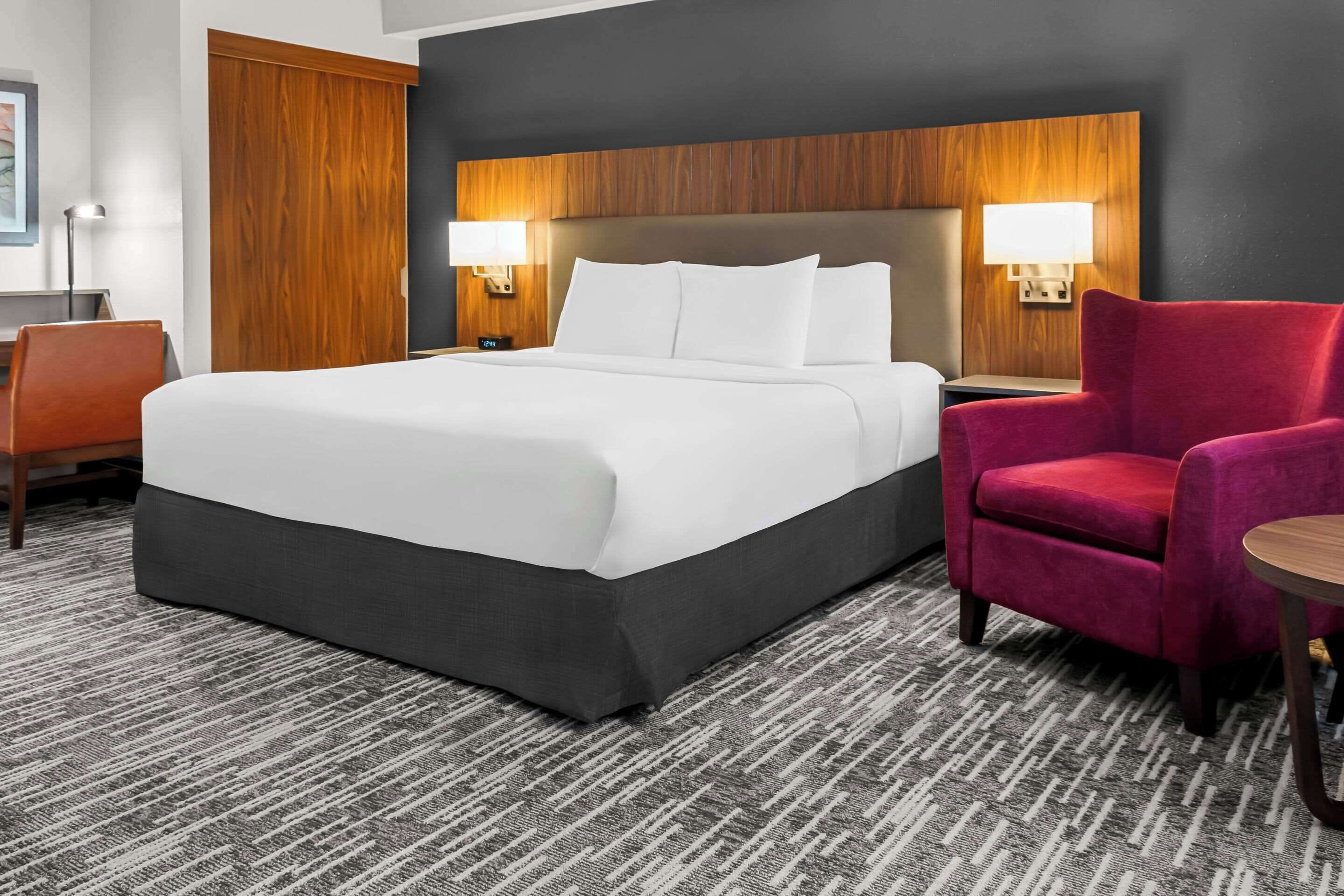 hypo-allergenic bedding, desk, blackout curtains, iron/ironing board