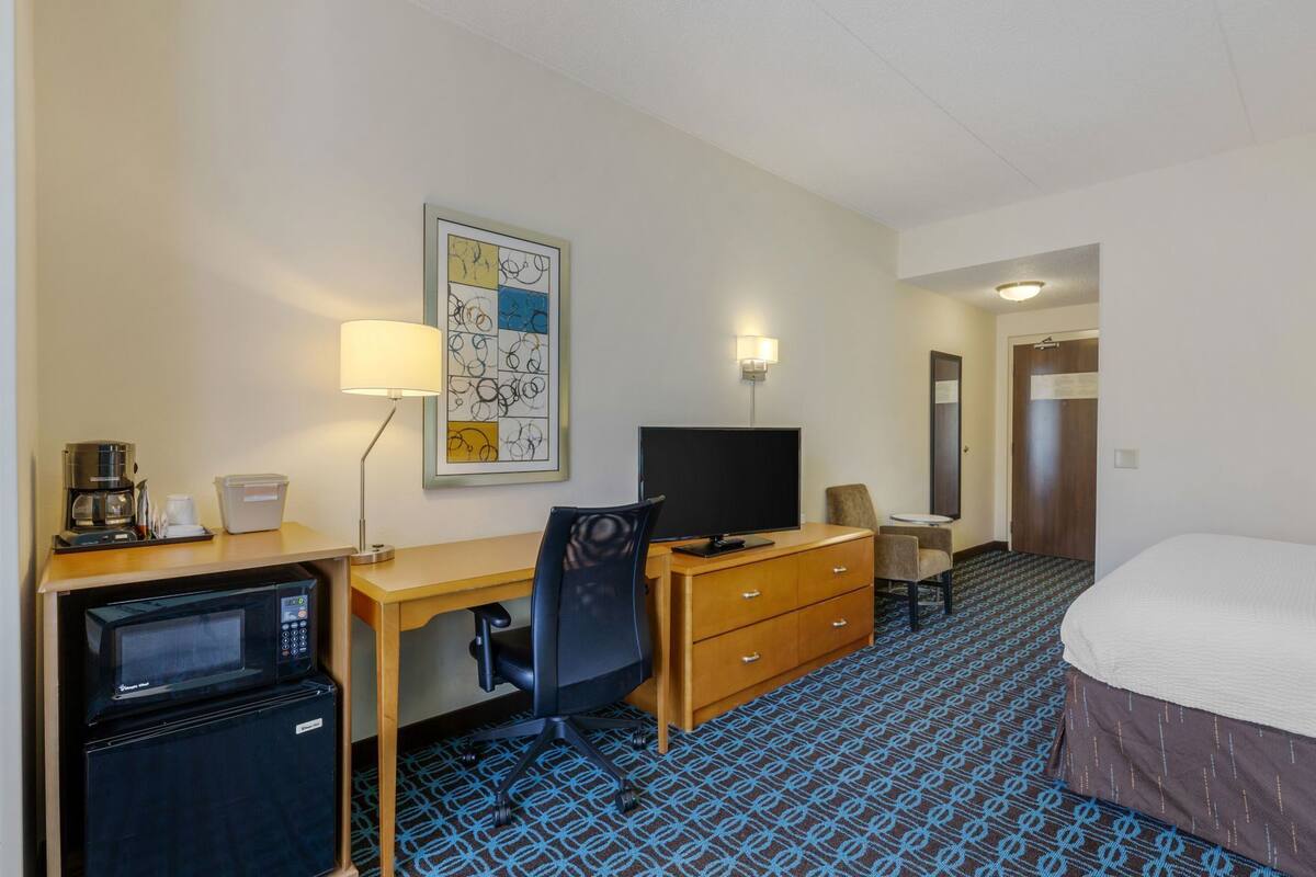 Down duvets, desk, blackout curtains, iron/ironing board