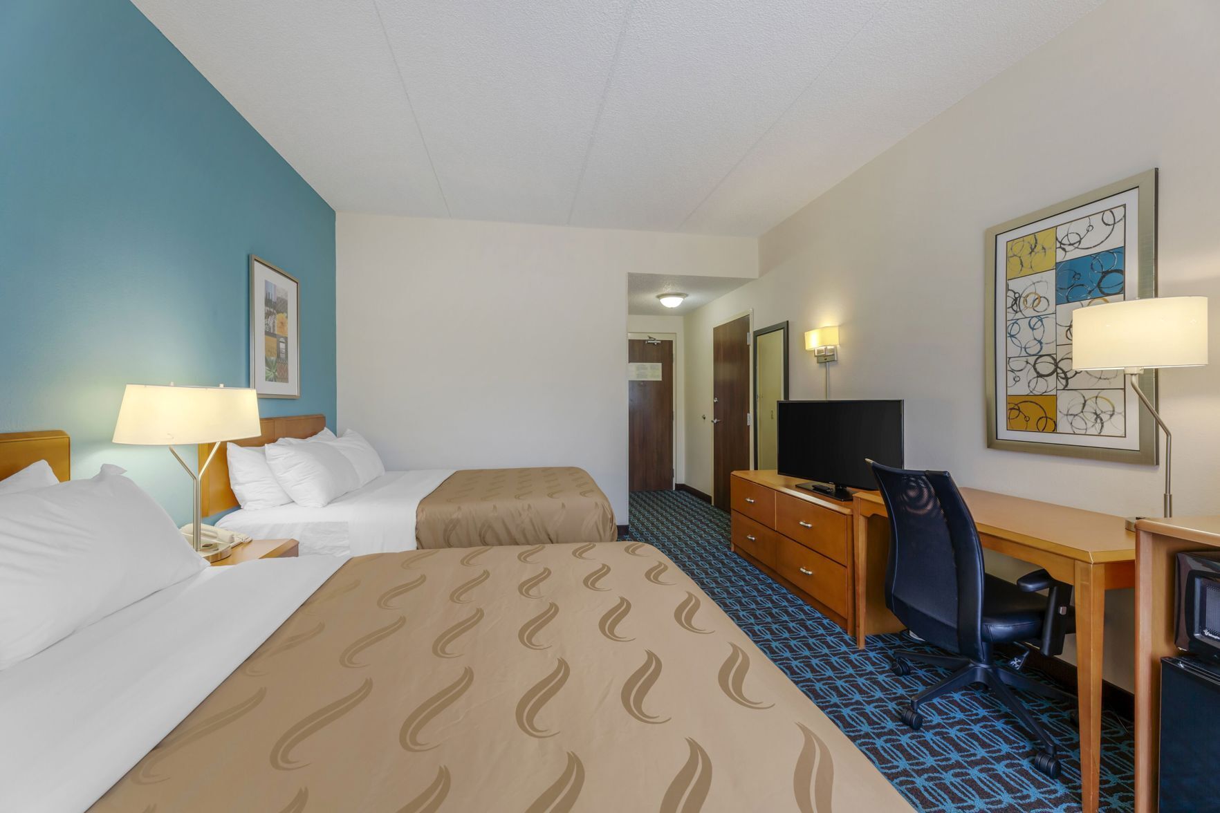 Down duvets, desk, blackout curtains, iron/ironing board