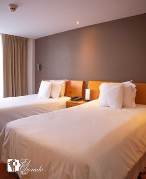 Habitació amb dos llits individuals executiva | Roba de llit d'alta qualitat i matalassos d'escuma viscoelàstica