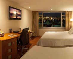 Premium bedding, memory-foam beds, minibar, in-room safe